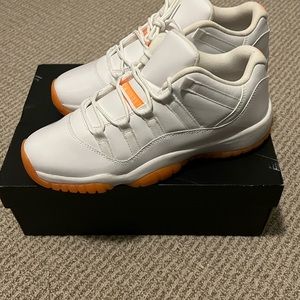 Nike Air Jordan 11 Retro Low GG in white and orange